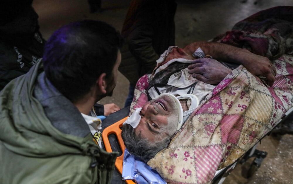 Injured people arrive at a hospital in Hatay following twin earthquakes  / ERDEM SAHIN