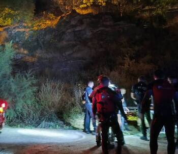 Rescatadas dos personas atrapadas en una roca de río Tajo